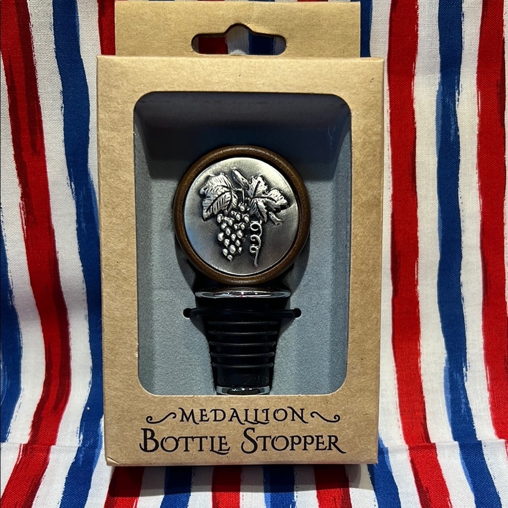 Medallion bottle stopper. Made by Prodyne